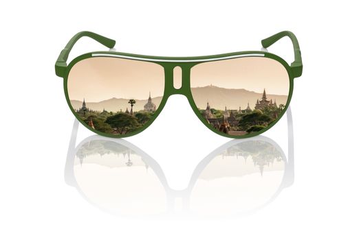Travel dreams. Antique bagan temples at sunset reflection in sunglasses isolated on white background. Asian travelling.