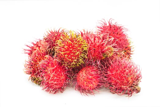 close up group of rambutan on white background