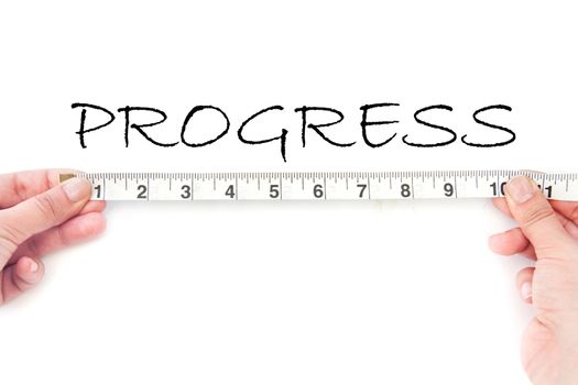 Tape measuring the text heading progress 