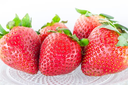 Organic Strawberry fruits nature on the glass dish