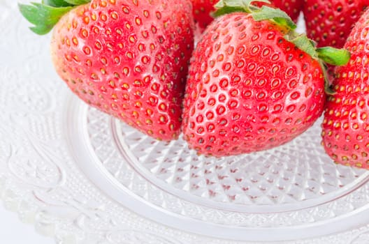 Organic Strawberry fruits nature on the glass dish
