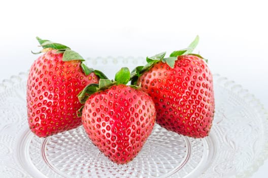 Organic Strawberry fruits nature on the glass dish