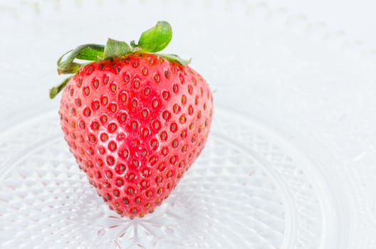 Organic Strawberry fruits nature on the glass dish