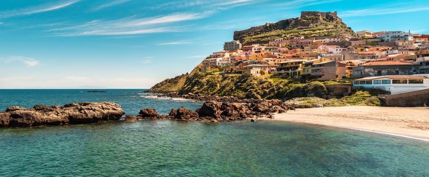 beach near the city of castelsardo in a sunny day