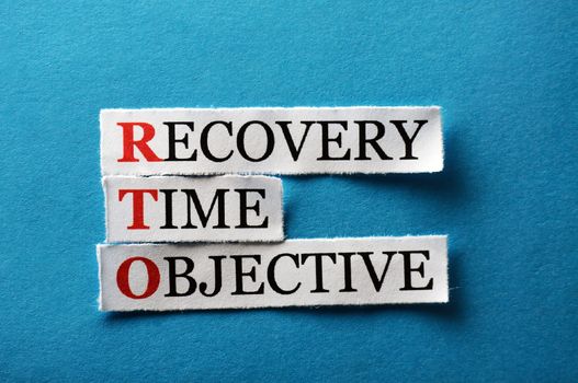 RTO acronym  - Recovery Time Management , words on cut paper hard light