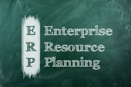  erp - enterprise resource planning on green chalkboard