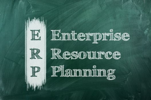  erp - enterprise resource planning on green chalkboard