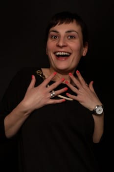 portrait of a stylish  woman in studio with astonished expression