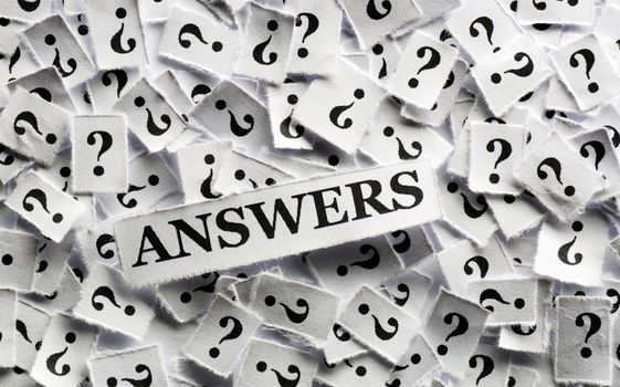answers  question marks on white papers -hard light