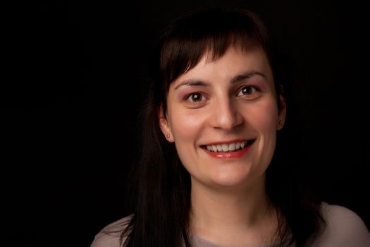 portrait of a stylish expressive woman in studio