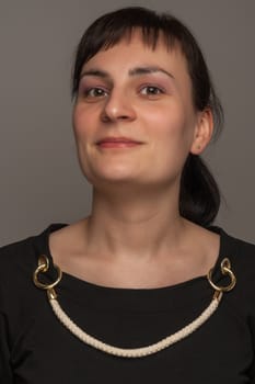 portrait of a stylish expressive woman in studio