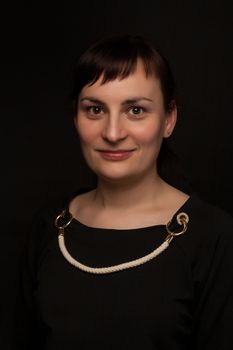 portrait of a stylish expressive woman in studio