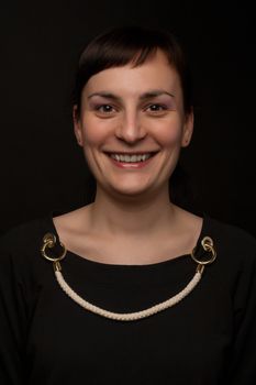 portrait of a stylish expressive woman in studio