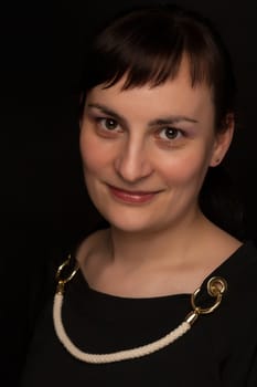 portrait of a stylish expressive woman in studio