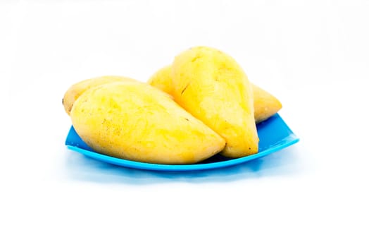 Yellow mango on a white background