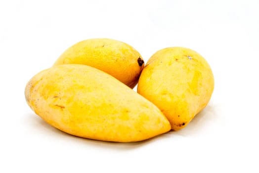 Yellow mango on a white background