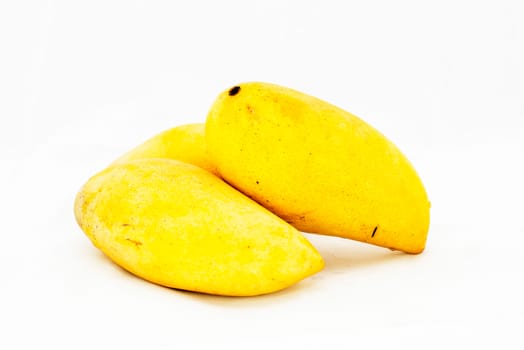 Yellow mango on a white background