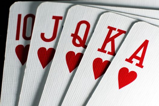Poker cards - royal flush on hearts, close-up