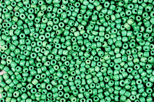 texture of small green   beads ,suitable for backgrounds