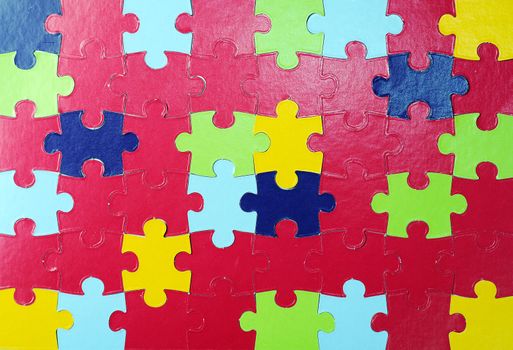 Many colored puzzle shiny  pieces  pattern photo 