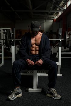 Portrait Of A Physically Fit Mature Man In A Healthy Club With Dramatic Lighting