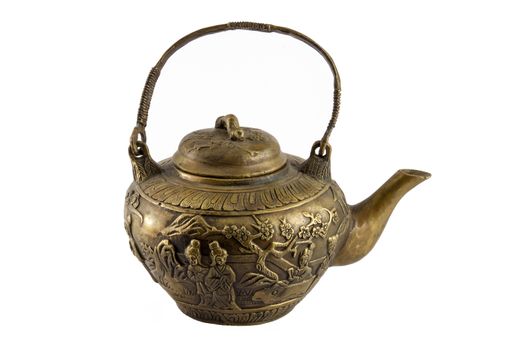 Isolated on White image of an antique chinese teapot with engravings of people and floral imagery with handle open and snout to right