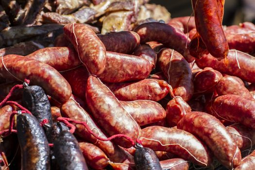 Cooked artisan sausages in a medieval fair