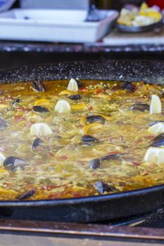 traditional Spanish paella, seafood and rice dish made ������with wood fire