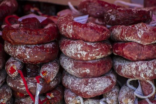 Dinner, artisan sausages in a medieval fair