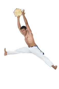 Capoeira, Brazilian Man jumping with tambourine