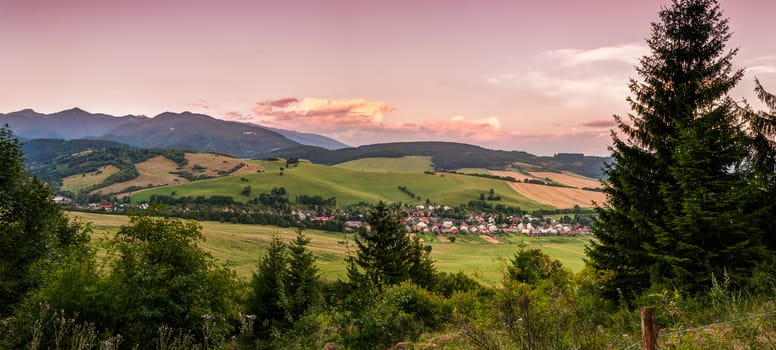 nature landscape with village and mountains, view towards west tatra mountains