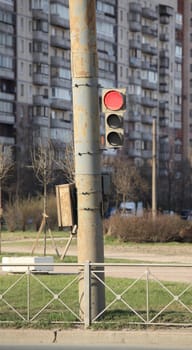 red light on the background of a multistory building