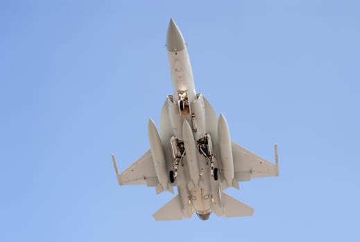 military fighter jet on landing approach