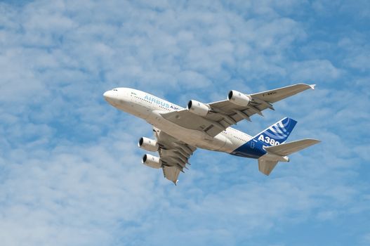 Farnborough, UK - July 16, 2010: A large Airbus A380 passenger aircraft just after take-off from Farnborough Airport, UK