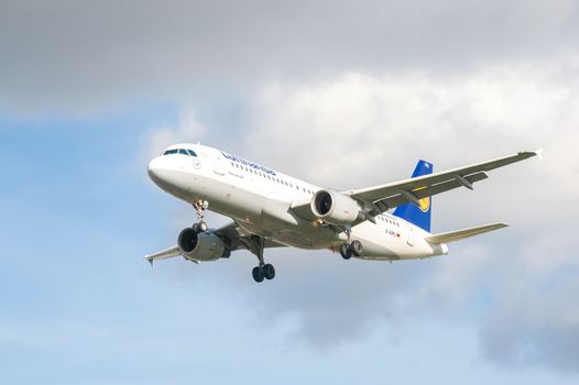 London, Heathrow, UK - October 30, 2012: Airbus A320 operated by German national airline Lufthansa on landing approach to London Heathrow Airport, UK