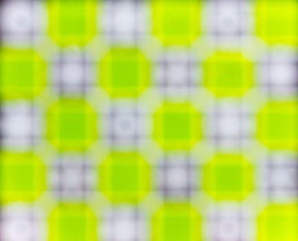 non specific pattern of colorful dots and squares on various color of background