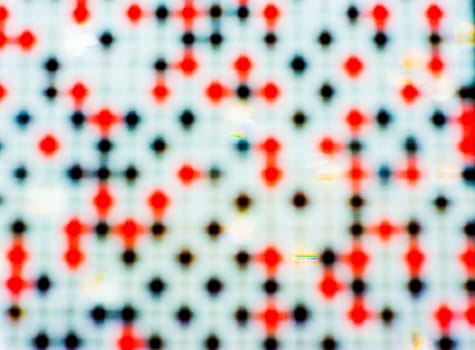 non specific pattern of colorful dots and squares on various color of background