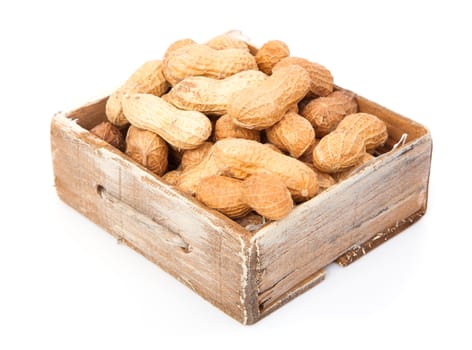 Peanuts in the old box, on white background