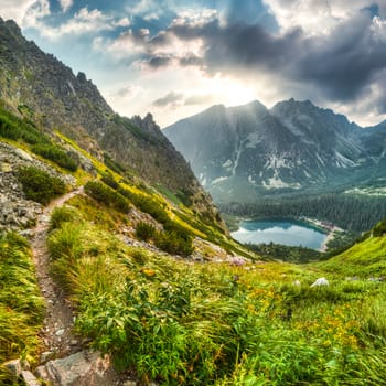 mountain landscape with mountain chalet near Poprad Pond, High Tatras, Slovakia