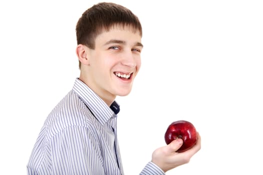 Handsome Teenager with an Apple Isolated on the White Background