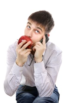 Teenager with Apple and Cellphone Isolated on the White Background