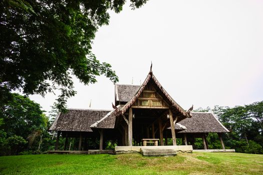 wooden Thai style pavilion in the garden