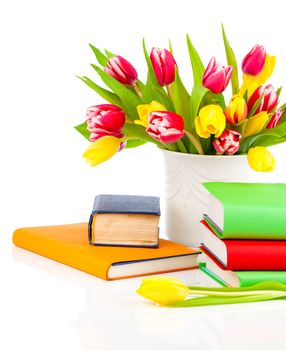 bunch of spring tulips and books, isolated on white background