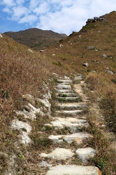 Stone path in the mountains at day
