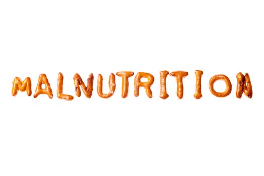 Word MALNUTRITION written, laid-out, with crispy alphabet pretzels isolated on white background