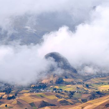 Clouds on the fields of Zumbahua in Ecuadorian Altiplano. Highland Andes near Quilotoa lagoon, South America