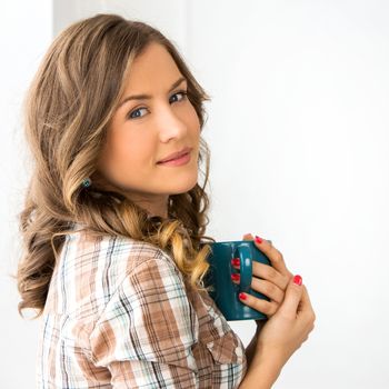 Attractive woman with tea cup