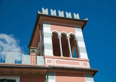 small tower on the roof of a country house