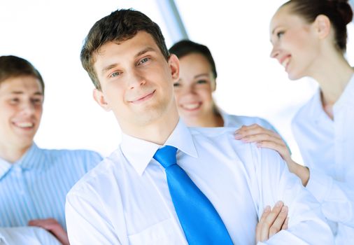 businessman receiving congratulations from his colleagues, business achievements