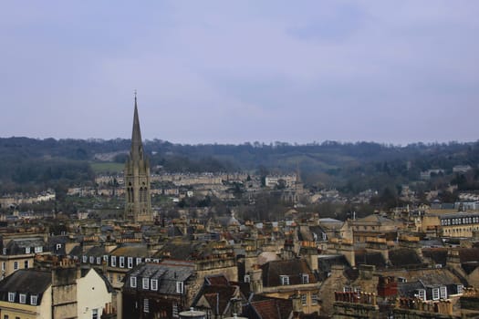 View of the city of bath. Clear view of the cities rooftops and chimneys.